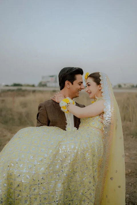 Bride and groom laughing together